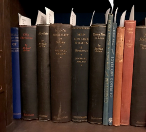 A row of old books on a shelf