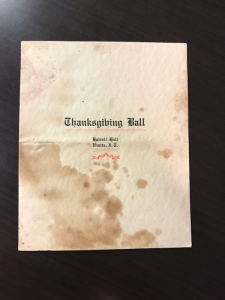 A small invitation stating "Thanksgiving Ball: Halsell Hall Vinita