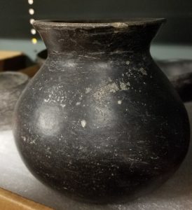 Photograph of a black ceramic vessel