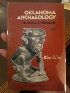 Photograph of the book Oklahoma Archaeology: An Annotated Bibliography by Robert E. Bell