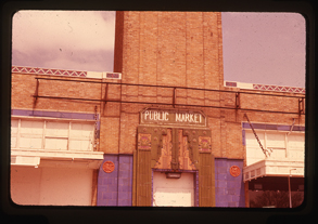 Color photograph of the Tulsa Public Market entrance and part of the tower