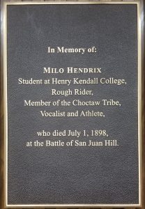 Color photograph of the large plaque in Chapman Hall dedicated to Milo Hendrix