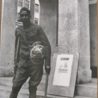 Tulsa Historical Society Collection: Wounded African American man at War Bond Rally; African American man in early war uniform